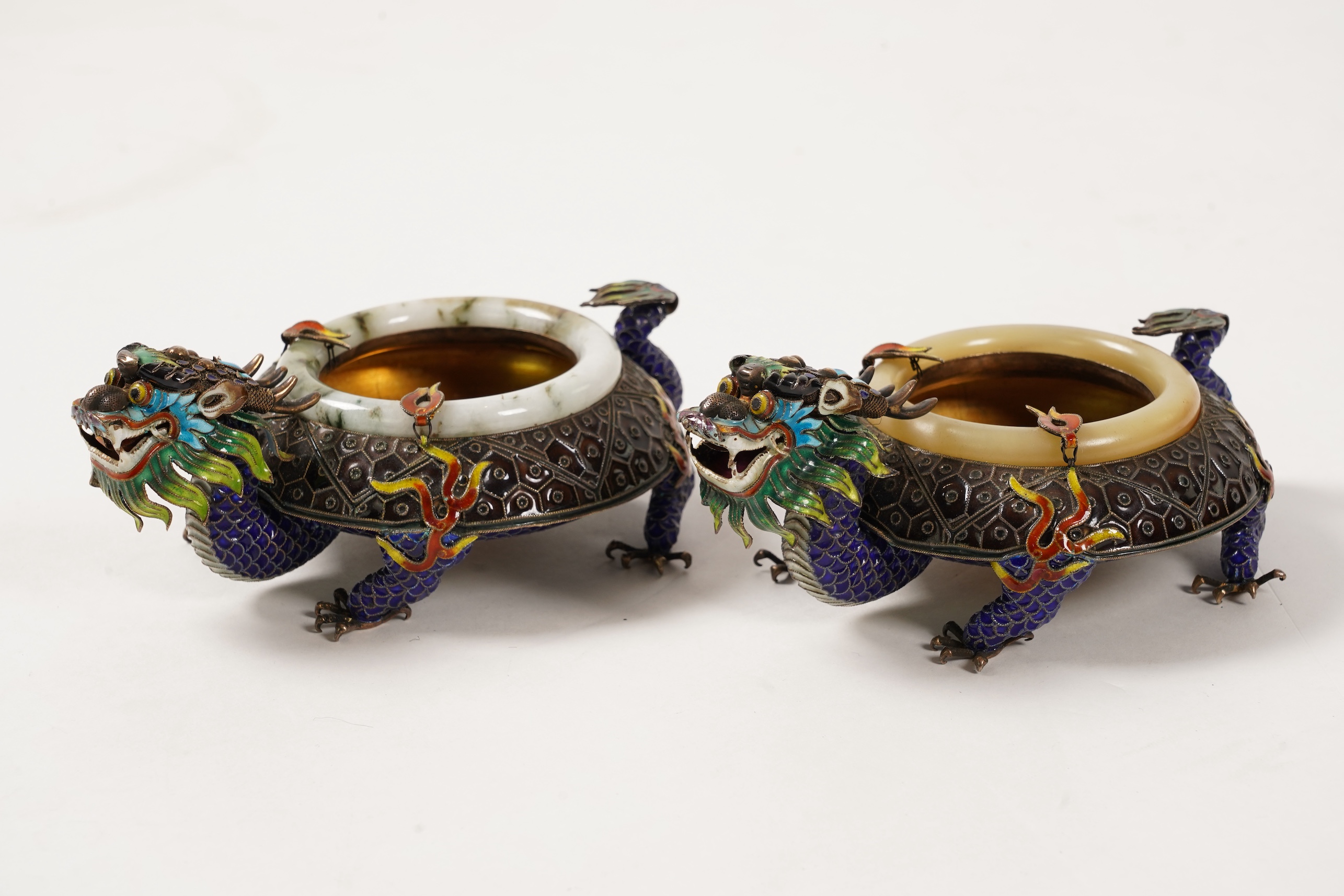A pair of Chinese silver-gilt and enamel ’dragon’ bowls, 20th century